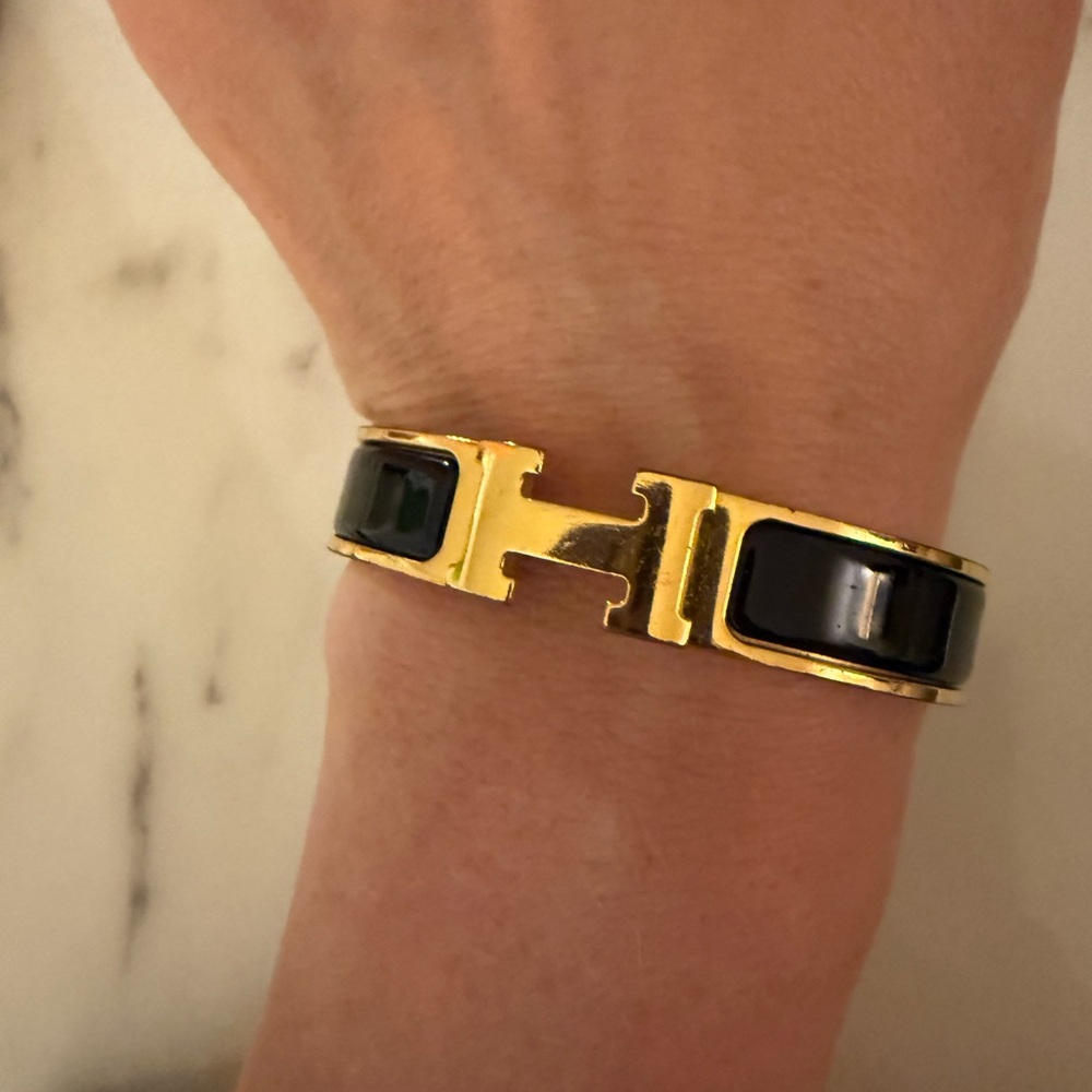 Hermes Clic H bracelet in black and gold
